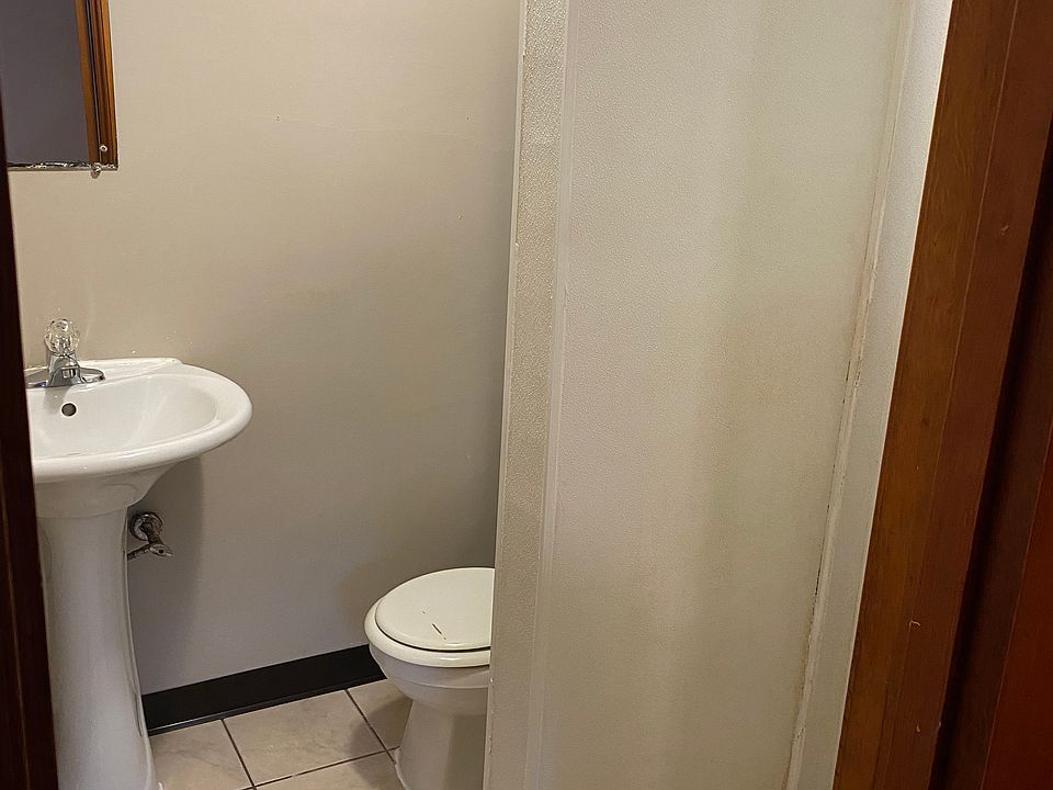 Bathroom with shower stall.
