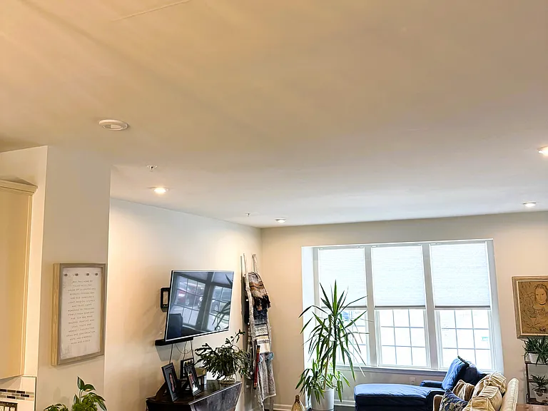 Well lit Family Room with lots of large windows