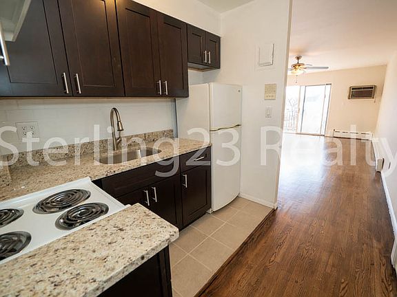 5th image of 42-11 Astoria Blvd N #3H