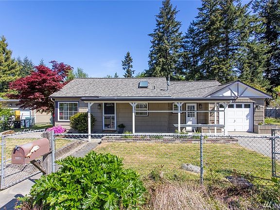 Great paint and trim colors, fenced yard and attached garage