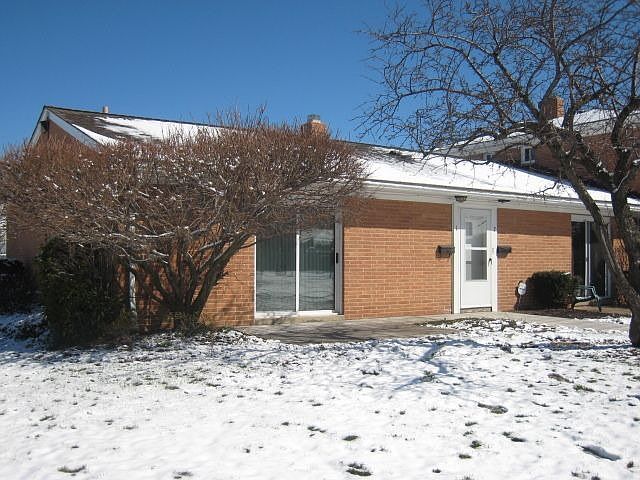 End unit, new concrete patio