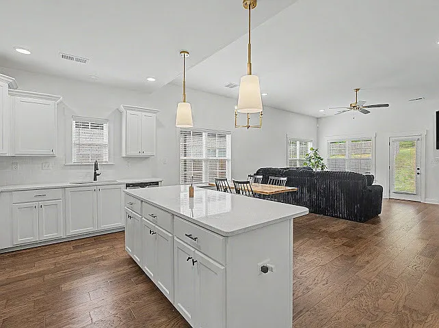 Large Spacious Kitchen Looking Into Living Room