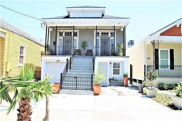 Entrance to unit is on the bottom right of the staircase