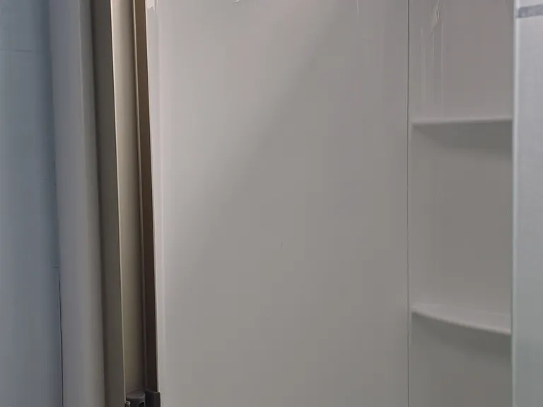 Second bathroom with sliding glass doors