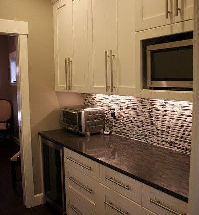 Butler pantry with tons of additional storage, including a standard pantry opposite of the current v