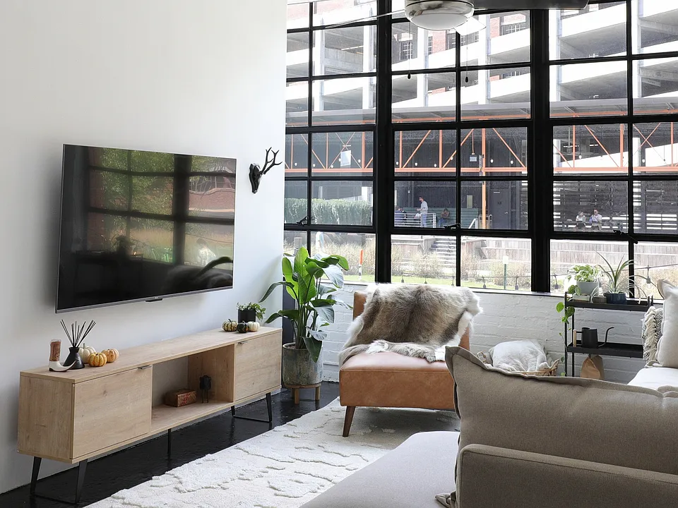 Factory Windows Living Room with Beltline View and Light Oak Sideboard