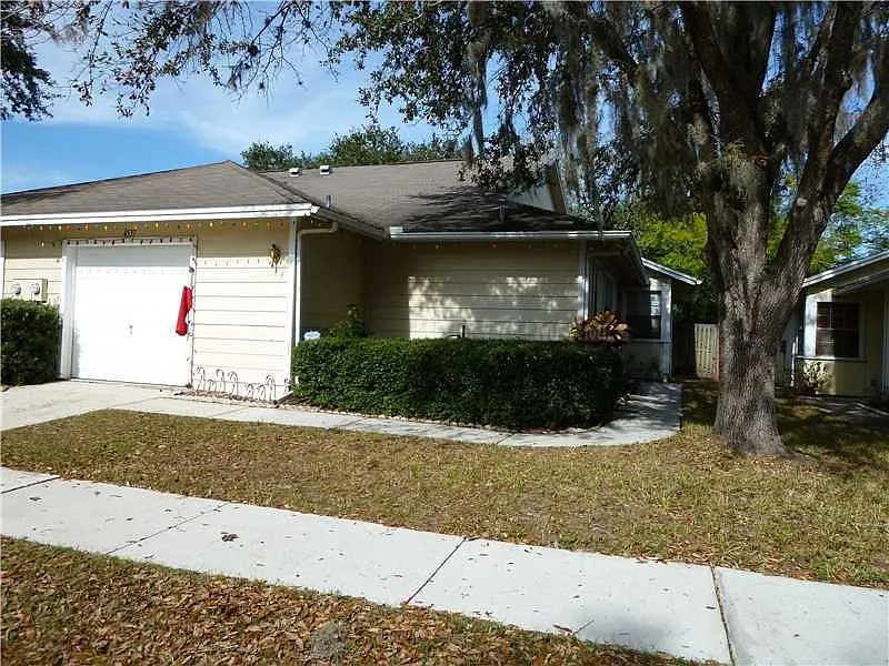 Side entrance with 1 car garage.