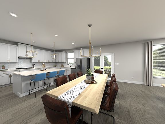 The open-concept floorplan allows for an easy flow between the kitchen and dining areas.