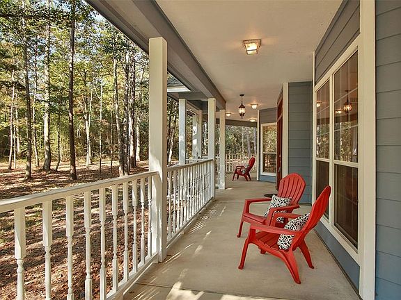 Wrap-around porch has plenty of usable space for your rocking chairs and loungers