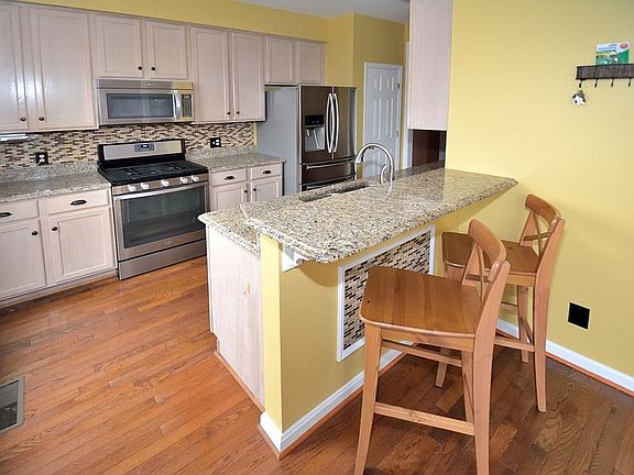 Renovated kitchen with stainless steel appliances