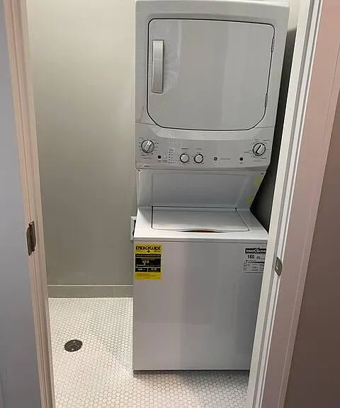 Stackable washer & dryer in the condo, right off the bedroom.