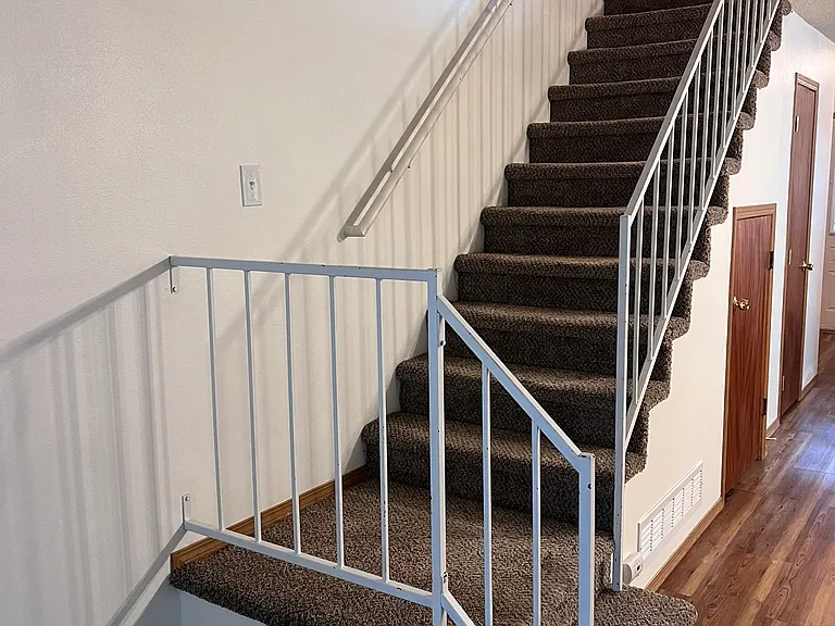 Stairs up to the second level.