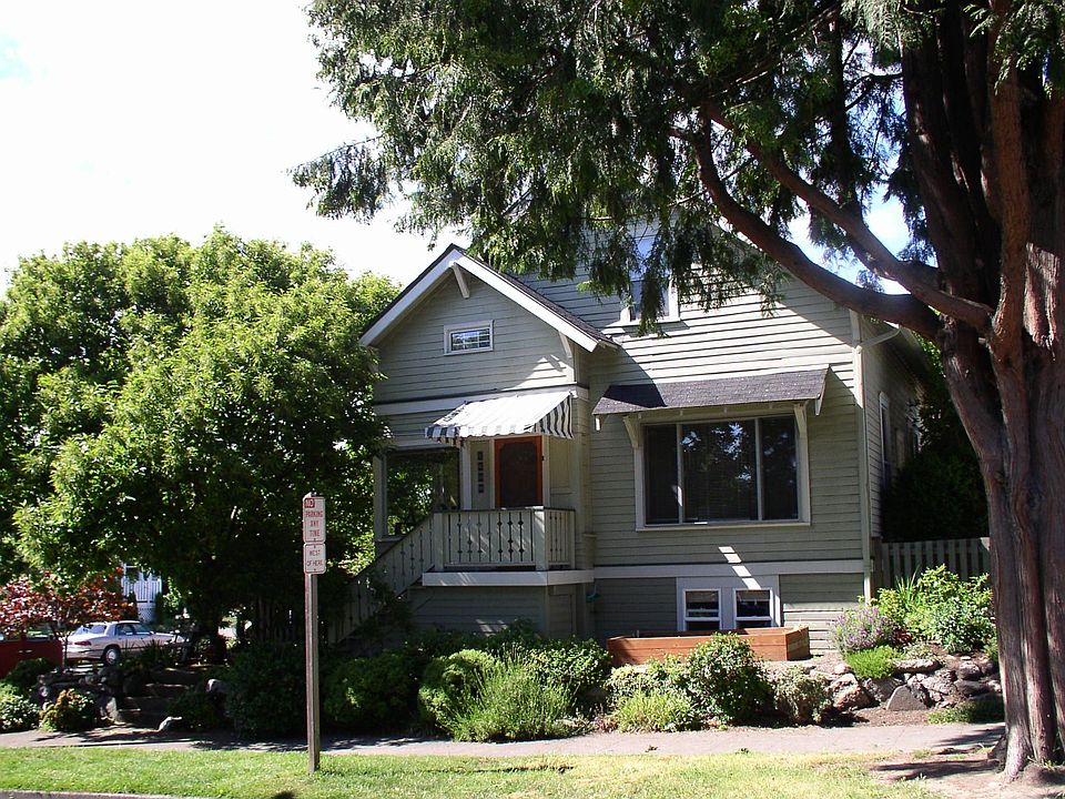 Awesome street appeal! Comfortable shaded entry with awning covered porch.