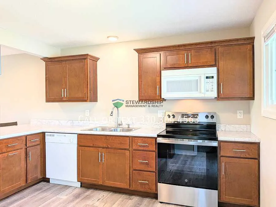 Building Photo - 6157 Kemary Ave SW #B