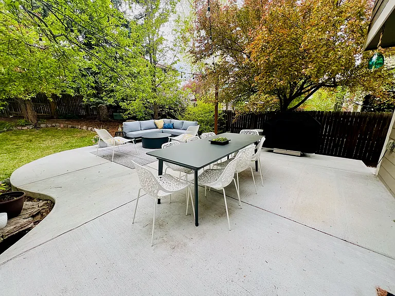 Newly expanded patio area with string lights - an entertainers dream!