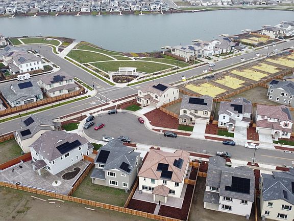 aerial view of home and nearby park & lake