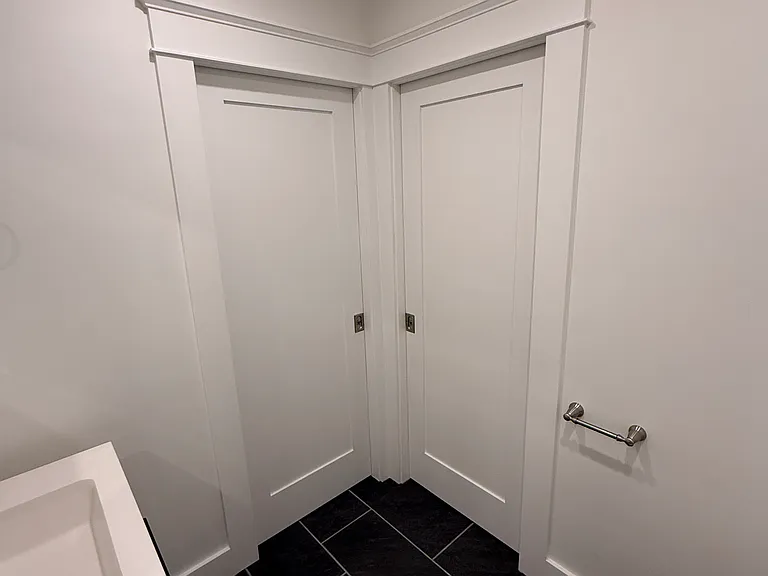 BATHROOM - ALTERNATE VIEW - SHOWING DOORS TO BOTH BEDROOMS
