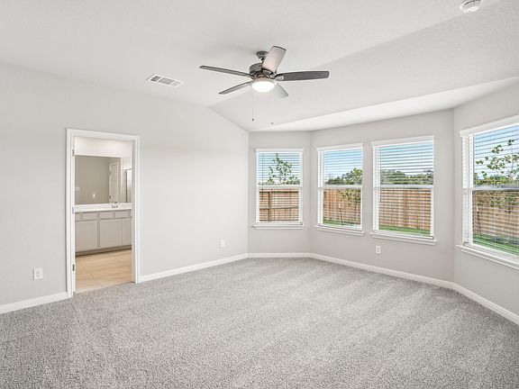 Primary suite in the Oleander floorplan at a Meritage Homes community.