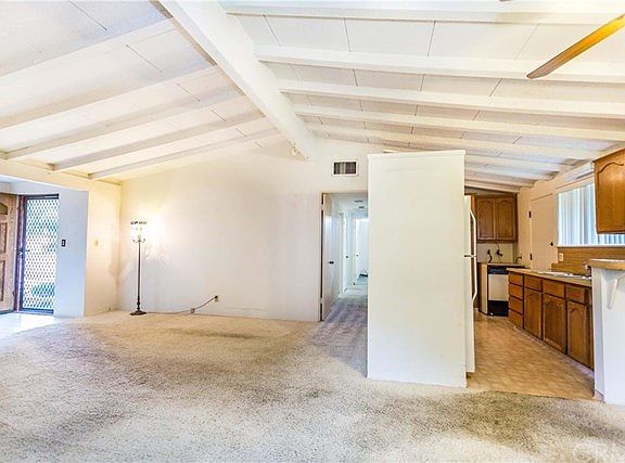 Living Room with Beamed Ceilings