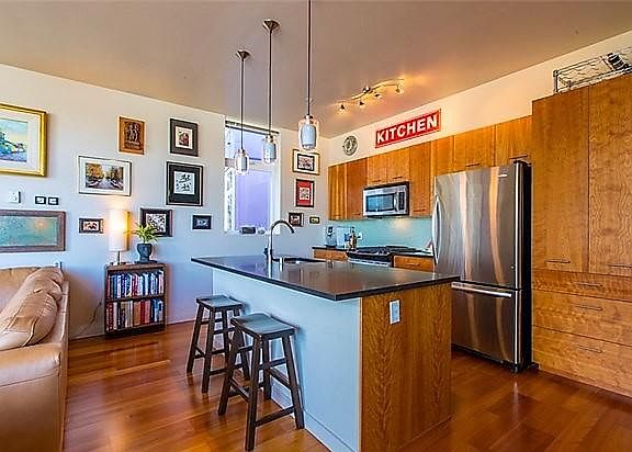 Bar seating and lots of storage in kitchen