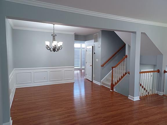 Main floor dining room off kitchen with 1/2 bath