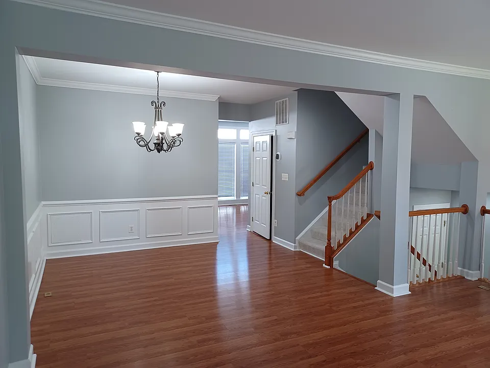 Main floor dining room off kitchen with 1/2 bath