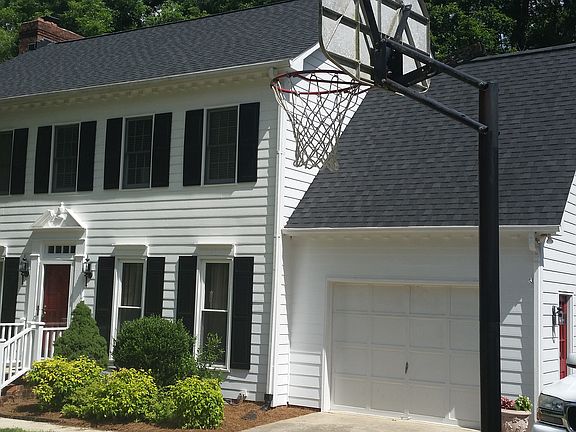 Basketball goal and flat driveway