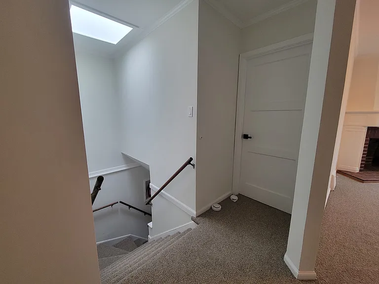Top of staircase towards front bedroom