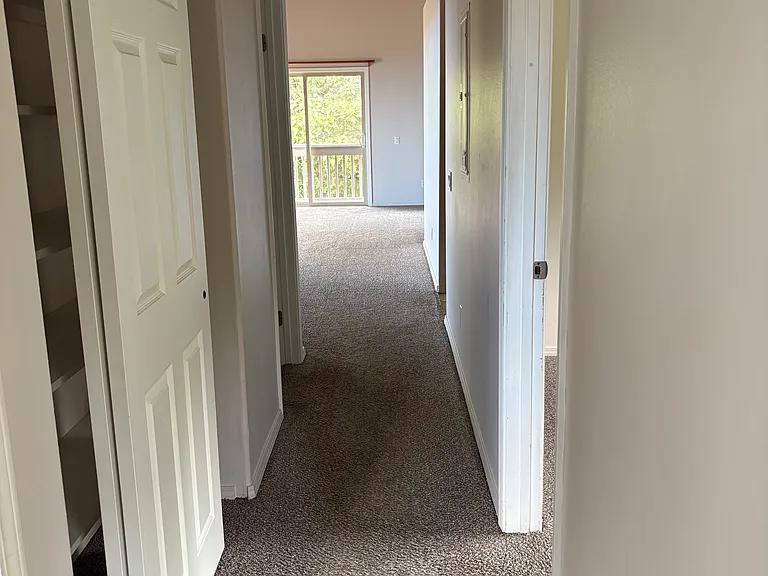 End of hallway, looking into the living room
