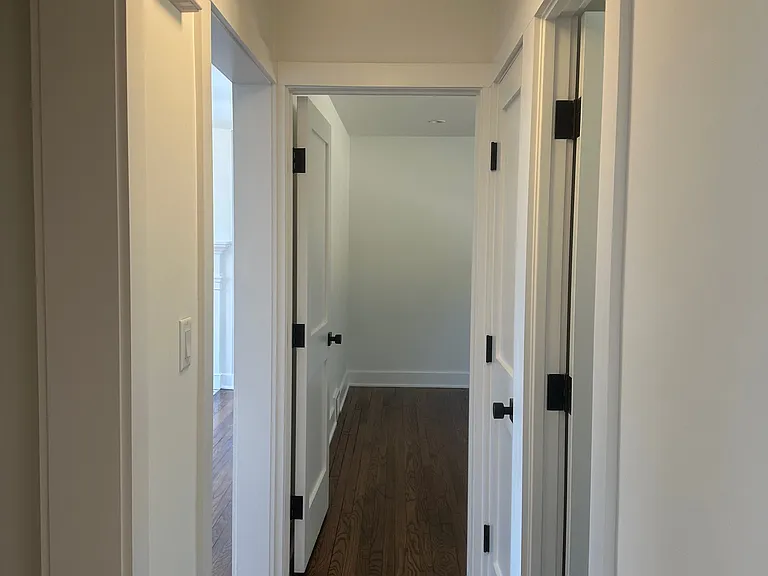 Hallway to bedroom on first floor / kitchen.