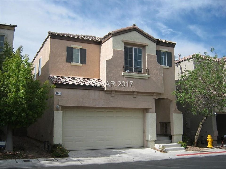 Welcome to the popular Southwest! This home features four bedrooms and is located in The Peaks commu