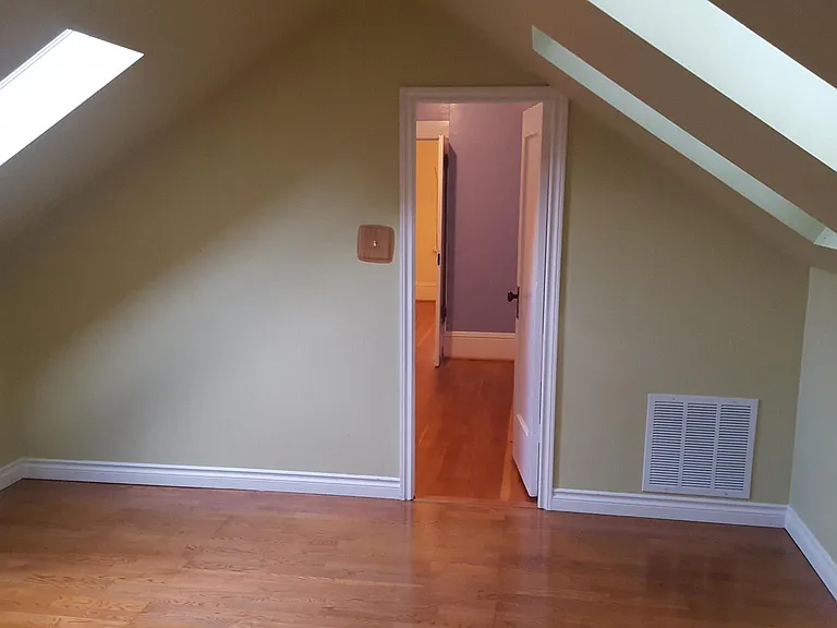Upstairs bedroom looking back through bonus room