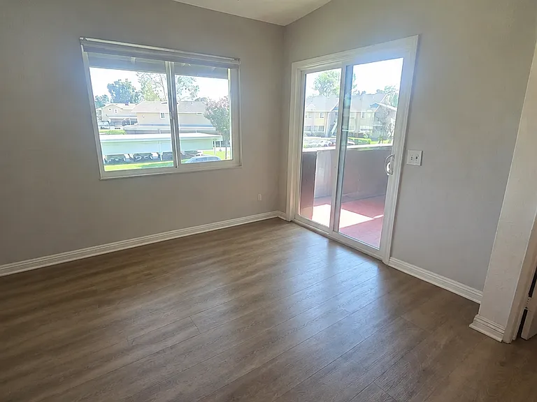 Window and Sliding Door to outdoor balcony patio.