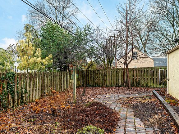 fenced yard with paver patio