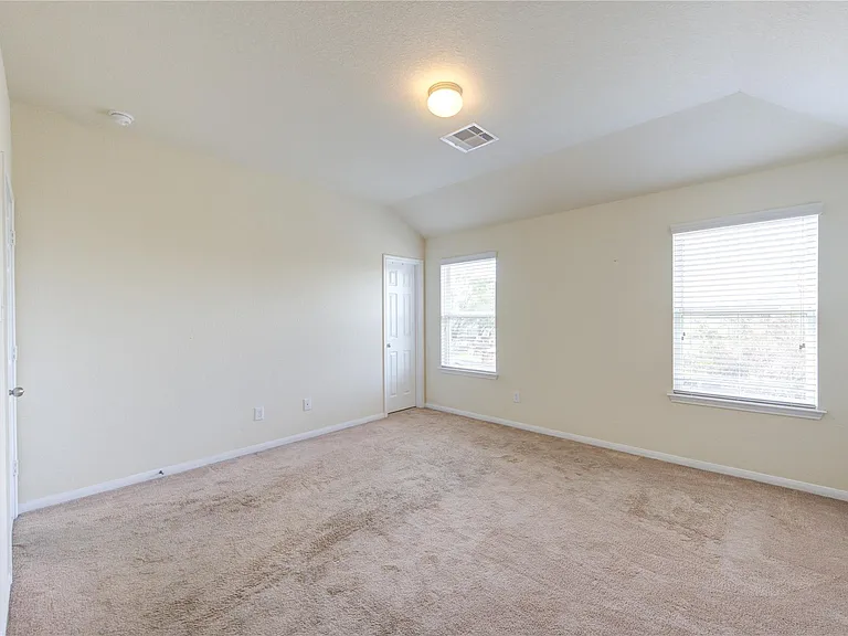 10907 Woodland Leaf Ln — Photo 23