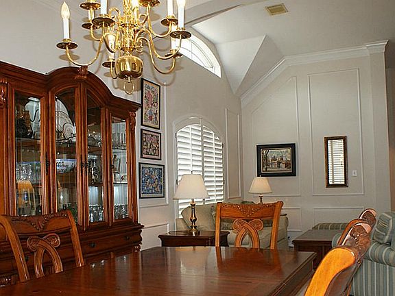 Formals with extensive crown moldings and chair molding!