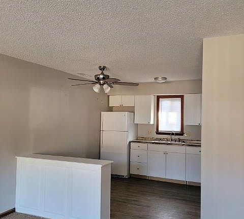 Redone kitchen, cabinets, flooring. The kitchen is open to living room