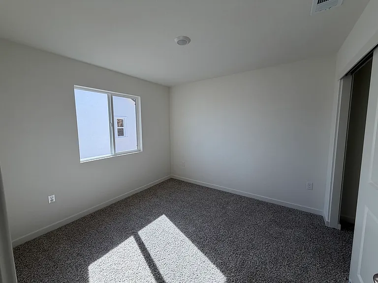 Bedroom 3 (Upstairs, front of the home)