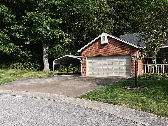 Ample parking with carport