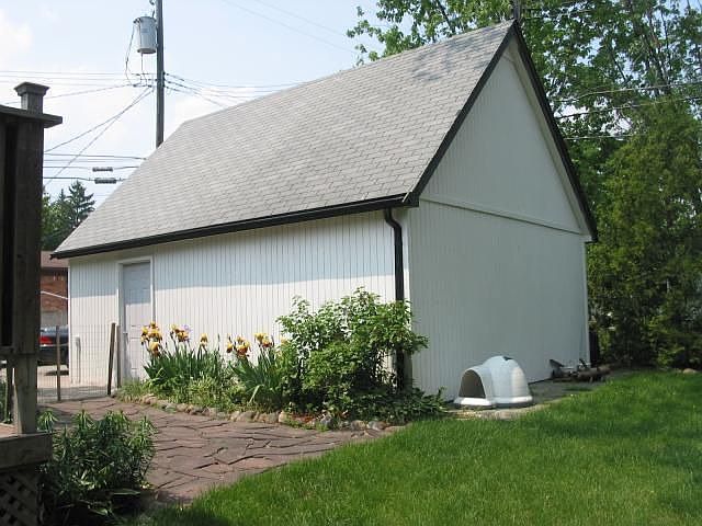Garage w/ Stairway to Loft