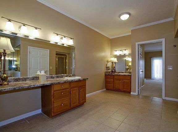 Master Bath Rm, new tile floor, double vanities, seperate tub and shower