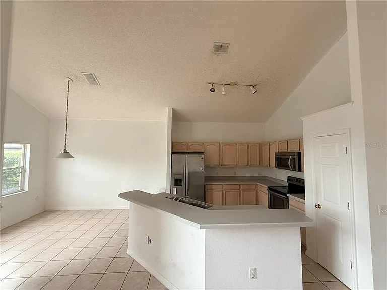 2918 Blooming Alamanda Loop — Photo 2