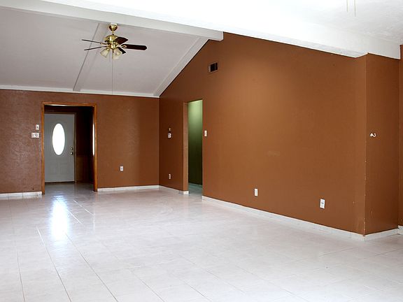 Spacious living room with tile floors