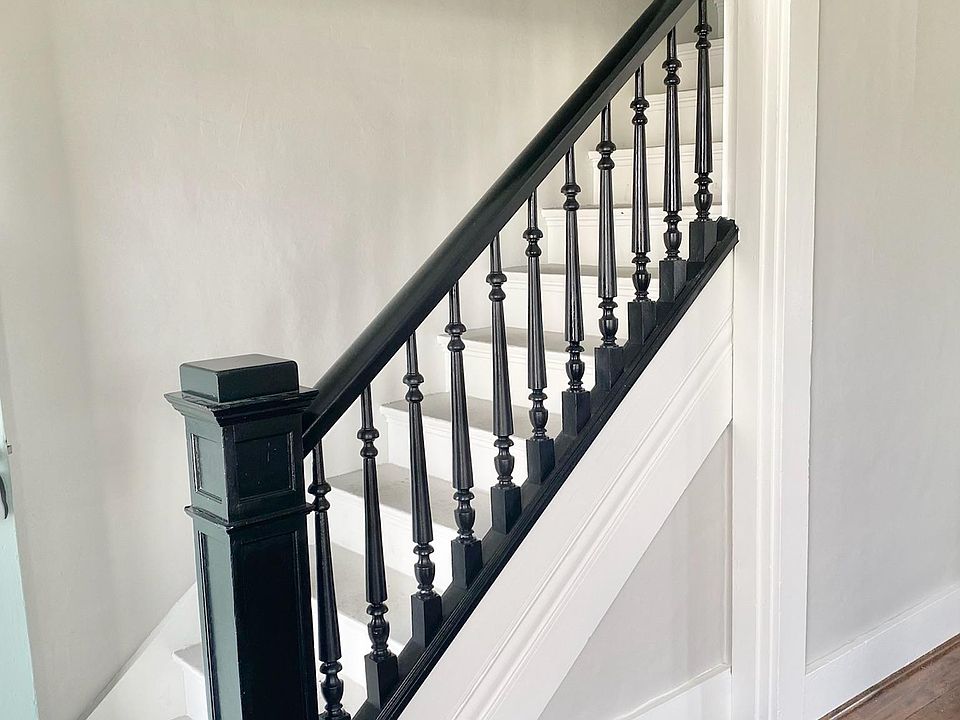 Enjoy the charm of the original duplex seen in things like the original wood floor & banister.