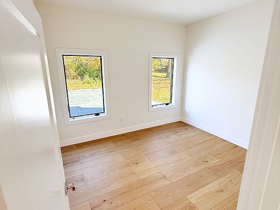 Secondary bedroom/office with built-in closet