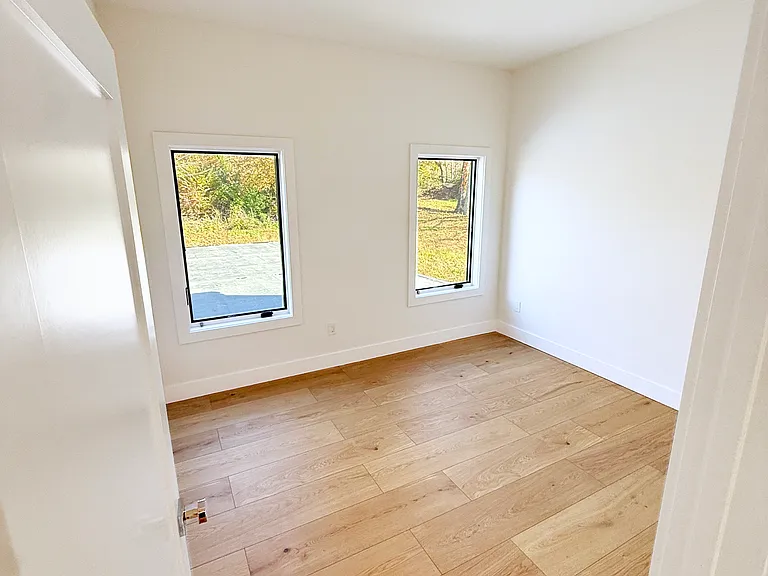 Secondary bedroom/office with built-in closet