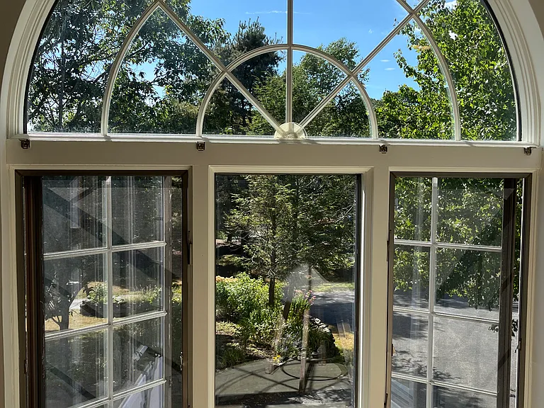 Palladian window view of gardens from Living/Dining/Kitchen area.
