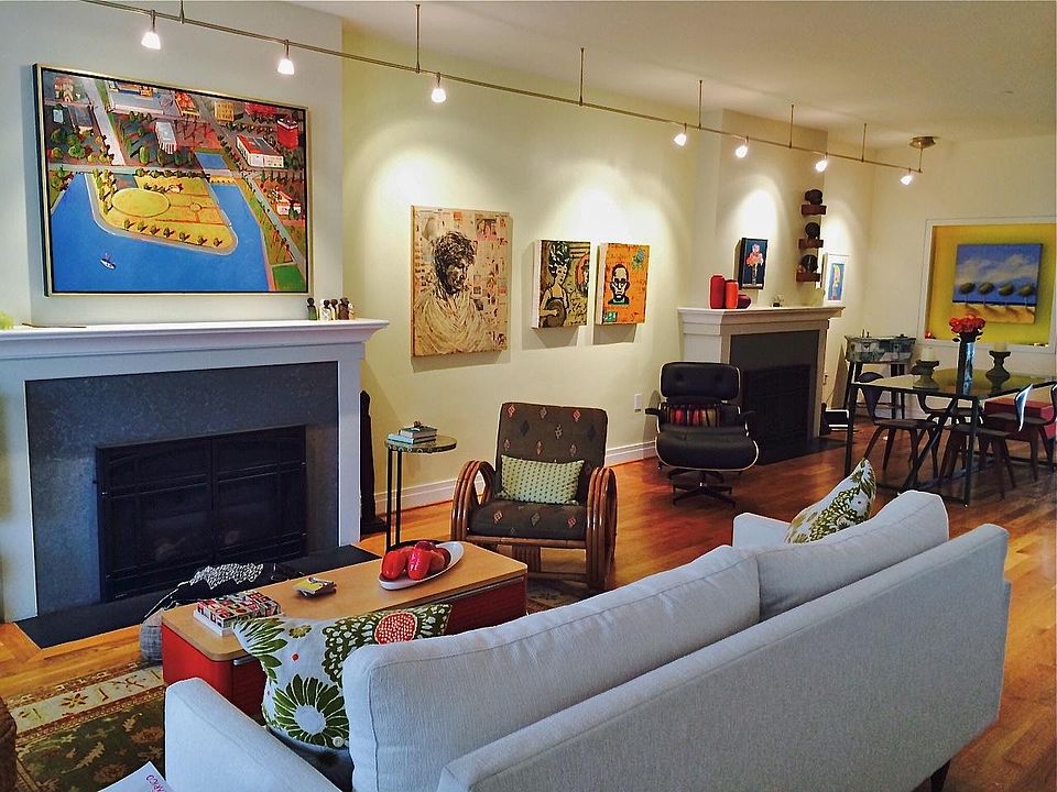 Living room with 2 fireplaces