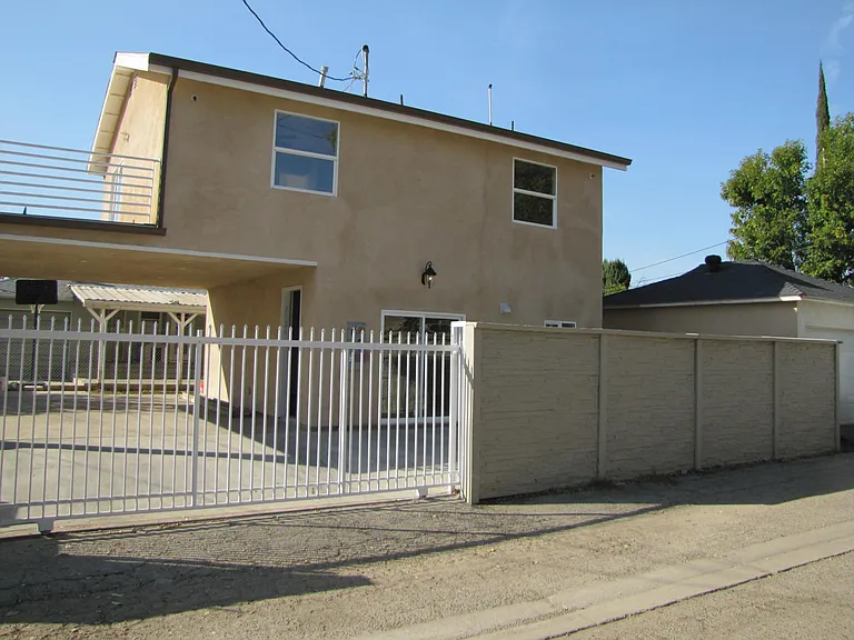 7026 N Tampa Ave — Photo 3