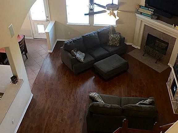 Two story, open concept living area. View from upstairs. Perfect for family and friend gatherings.